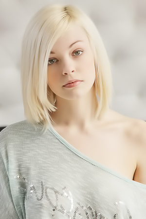 Skinny, platinum-blonde Bree strips
