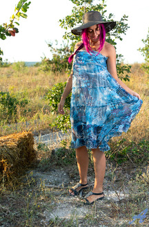 Victoria Rainbow Spreading Herself Out On A Picnic Blanket