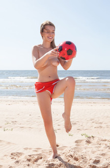 Dominika Jule Strips Barefoot On The Beach With Spread Legs And Foreign Objects