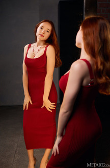 Rinna Ly Sultry Redhead Watches Herself In The Mirror