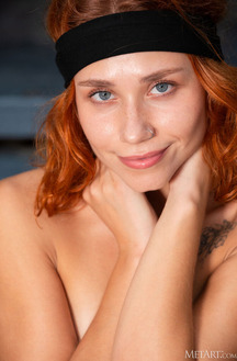 Polly Flame Offering A Cheeky Rear View Of Her Bare Booty In Thong Panties