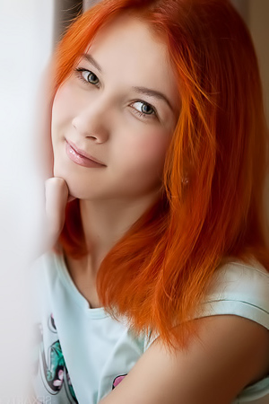 Cute redhead beauty solo