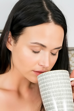 Bella B Excited chick squeezes natural tits in the kitchen