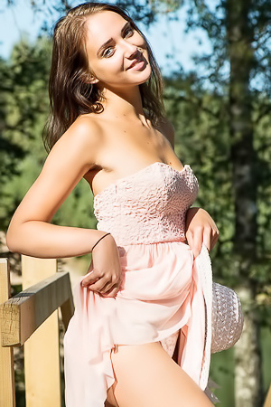 Amazing brunette is happy to get naked