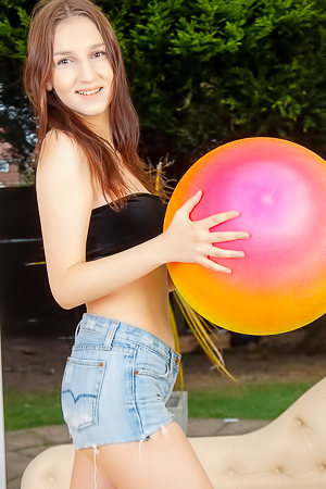 Elena Parkov removes her little black top and jeans shorts, exposing her boobs