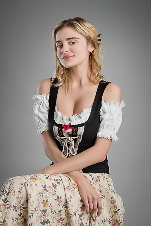 Marria Leeah undresses, exposing her slim frame and picture-perfect breasts