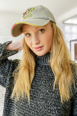 Dana Red With Strawberry-blonde Hair Lounging Naked In An Armchair