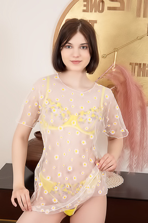 Sara Celeste Bending Over To Show How Her Thong Panties Nestle Between Her Perfect Buns