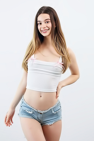 Molly Little exposes her slim body, round ass and pink pussy in the bedroom