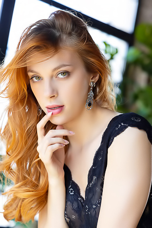 Naty Evans Entices In Revealing Striptease Showcasing Lustful Curves