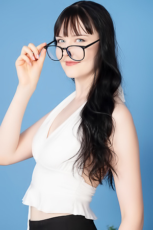 Amelia Riven Seduces In A Mini Skirt Striptease With A Mesmerizing Gaze
