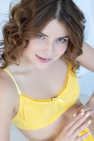 Julia Morozzis Inviting Hungry Gaze From Bedroom Chair